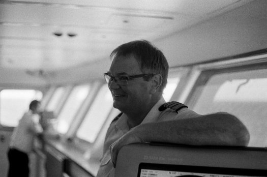 Norwegian Captain, Terje Ulset takes a moment to relax on the Bridge, in his very serious job of being responsible for every last one of the 2100 souls onboard.